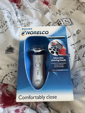 7350 Philips Norelco Orange Handled Comfortably Close Shaver New Sealed 7350 Philips Norelco Orange Handled Comfortably Close Shaver New Sealed