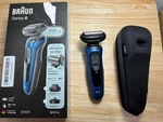 Braun Series 6040CS Electric Shaver With Charging Stand - Blue. Fixed Price $85.00.
