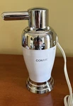 Conair Heated Lotion Dispenser - Chrome & White . Model HLD31. Fixed Price $12.00.