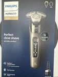Philips Norelco Electric Shaver I9000 Wet & Dry Dark Slate Senseiq Pod X9002/82. Fixed Price $149.99.