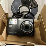Ge Digital Camera 1233 With Box Book And Cd User Manual Plus Cord. Fixed Price $25.00.