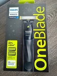 Philips Norelco Oneblade Hybrid Trimmer Shaver With 2 Combs New !. Fixed Price $20.99.