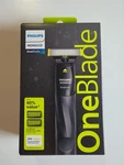 Philips Norelco Oneblade Men's Wet & Dry Trimmer Shaver W/ 2 Trimming Combs New. Fixed Price $20.00.