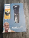 Philips Norelco Caretouch, Rechargeable Wet & Dry With Pop-up Trimmer, S3210/51. Fixed Price $21.00.