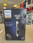 Philips Norelco 9000 Prestige Shaver W/qi Charging Pad - Black (SP9872/86). Fixed Price $250.00.