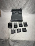 Oster Universal Comb Attachments Set Of #76926-700. Fixed Price $13.40.