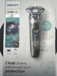 Philips Norelco Shaver 7300, Rechargeable Wet/dry Pop-up Trimmer S7887/92. Fixed Price $90.99.