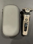 Philips Norelco S9000 Prestige Electric Shaver SP9883/83 For Dry/wet Use 50/60HZ. Fixed Price $99.99.