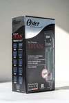Oster Titan 2 Speed Universal Motor Clipper W/coated Detachable #000 & #1 Blades. Fixed Price $160.00.