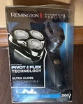 Remington Pivot & Flex Razor. Fixed Price $45.00.