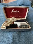 Vintage Norelco Speedshaver Floating Heads Electric Razor With Case Navy White. Fixed Price $7.49.