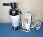Conair Hot Lotion Dispenser, Chrome And White Design HLD31. Fixed Price $20.95.