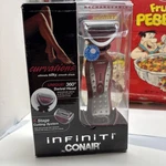 Conair Women's Infiniti Curvations Wet/dry Shaver Rechargeable Cordless Sealed. Fixed Price $25.46.