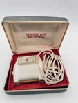 Vintage Remington Roll-a-matic Electric Shaver Men's White Corded Dual Voltage. Fixed Price $12.99.