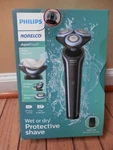 New Philips Norelco Aqua Touch, Wet And Dry Protective Shaver Series 5000. Fixed Price $49.99.