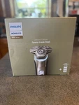 Philips Norelco 9000 Limited Edition Space-grade Steel Barely Used, Read Desc. Fixed Price $110.00.