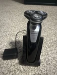 Philips Norelco Sensotouch 1255X Electric Shaver Razor & Charger. Fixed Price $60.00.