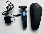 Philips Norelco Model S8950 Wet/dry Rechargeable Electric Razor Shaver + Charger. Fixed Price $26.99.