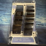 New Oster Professional Universal Comb Set 10 Guide Attachments Part# 141922. Fixed Price $31.77.